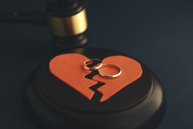 Wedding rings on a judge's gavel